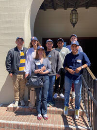 I-House alumni from 2021-22 proudly wearing their I-House alumni hats at the All Years Alumni Reunion.