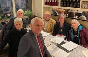 Photo of six I-House Berkeley alumni at a dinner table in Paris, France