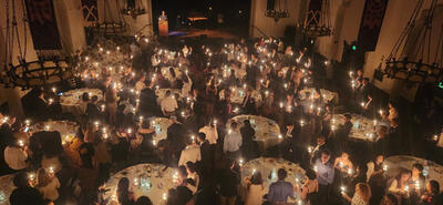 Aerial view of candlelight ceremony at Sunday Supper