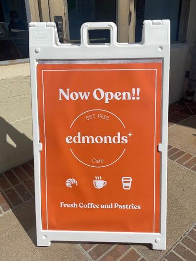 edmonds cafe now open sandwich board sign